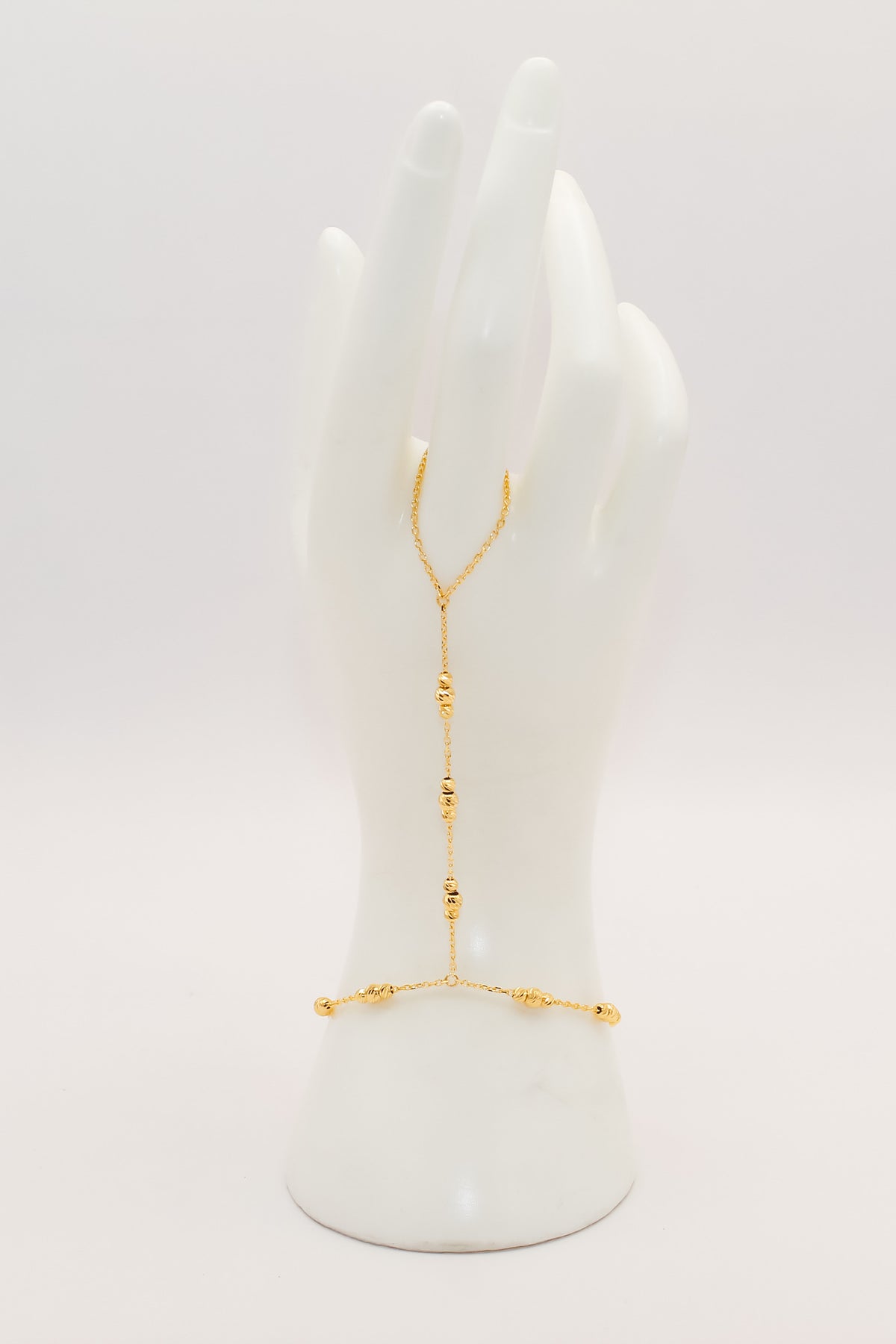 21k gold beaded hand bracelet