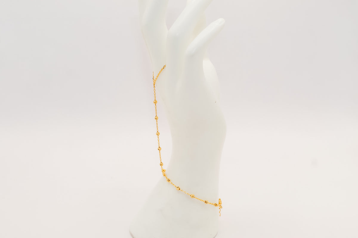 21k gold beaded hand bracelet