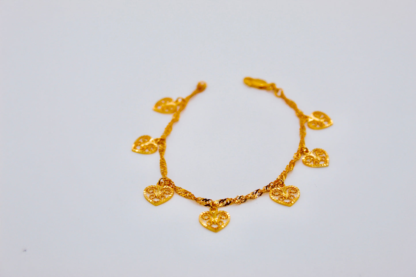 21k Gold Heart Charm Bracelet