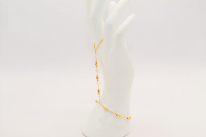 21k gold beaded hand bracelet