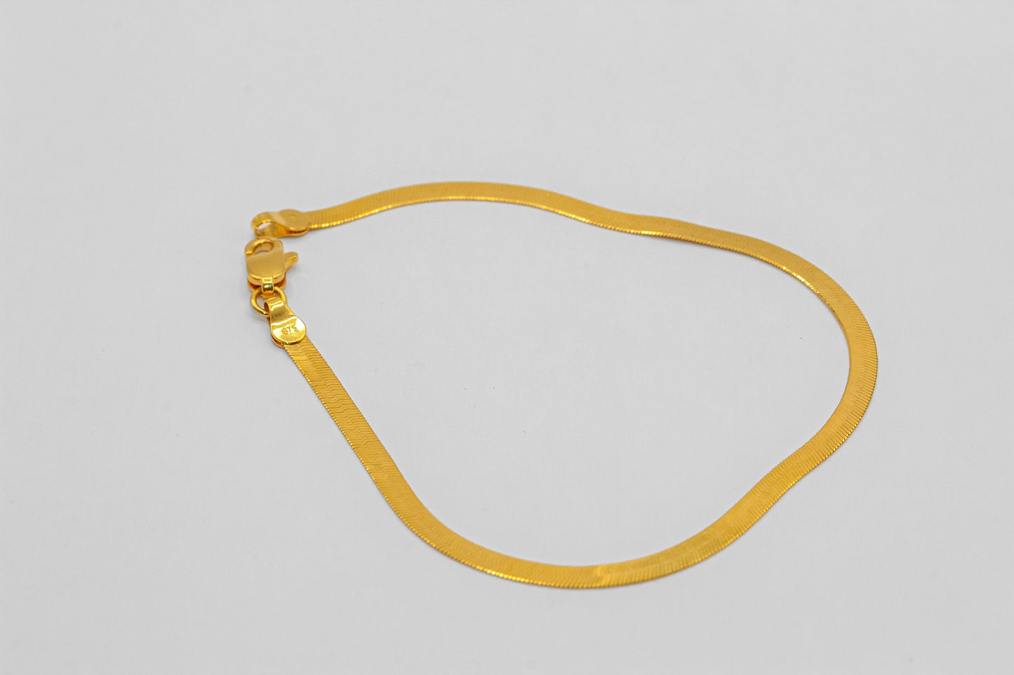 21K Gold Herringbone Bracelet