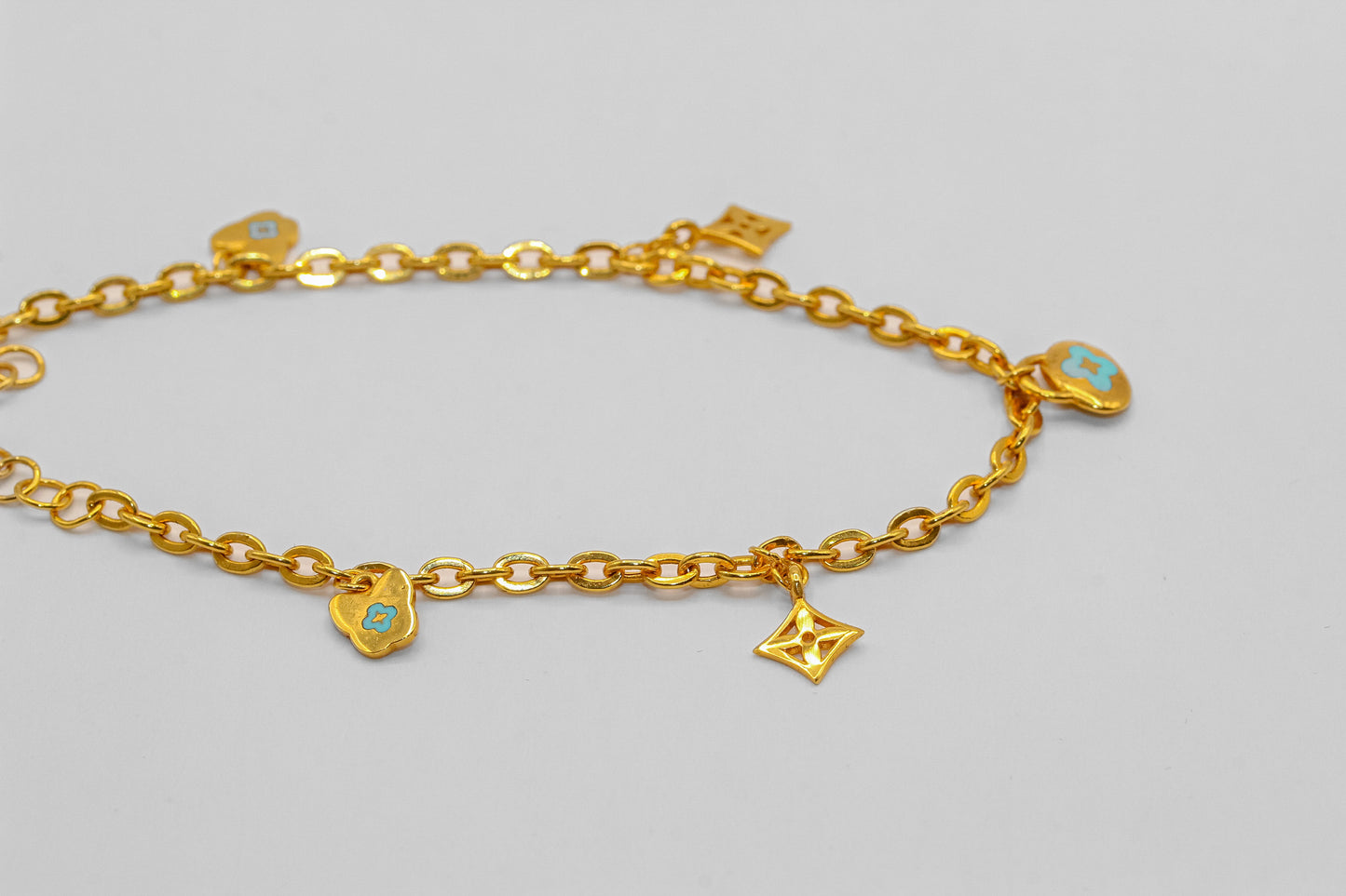 21K Gold Charm Bracelet